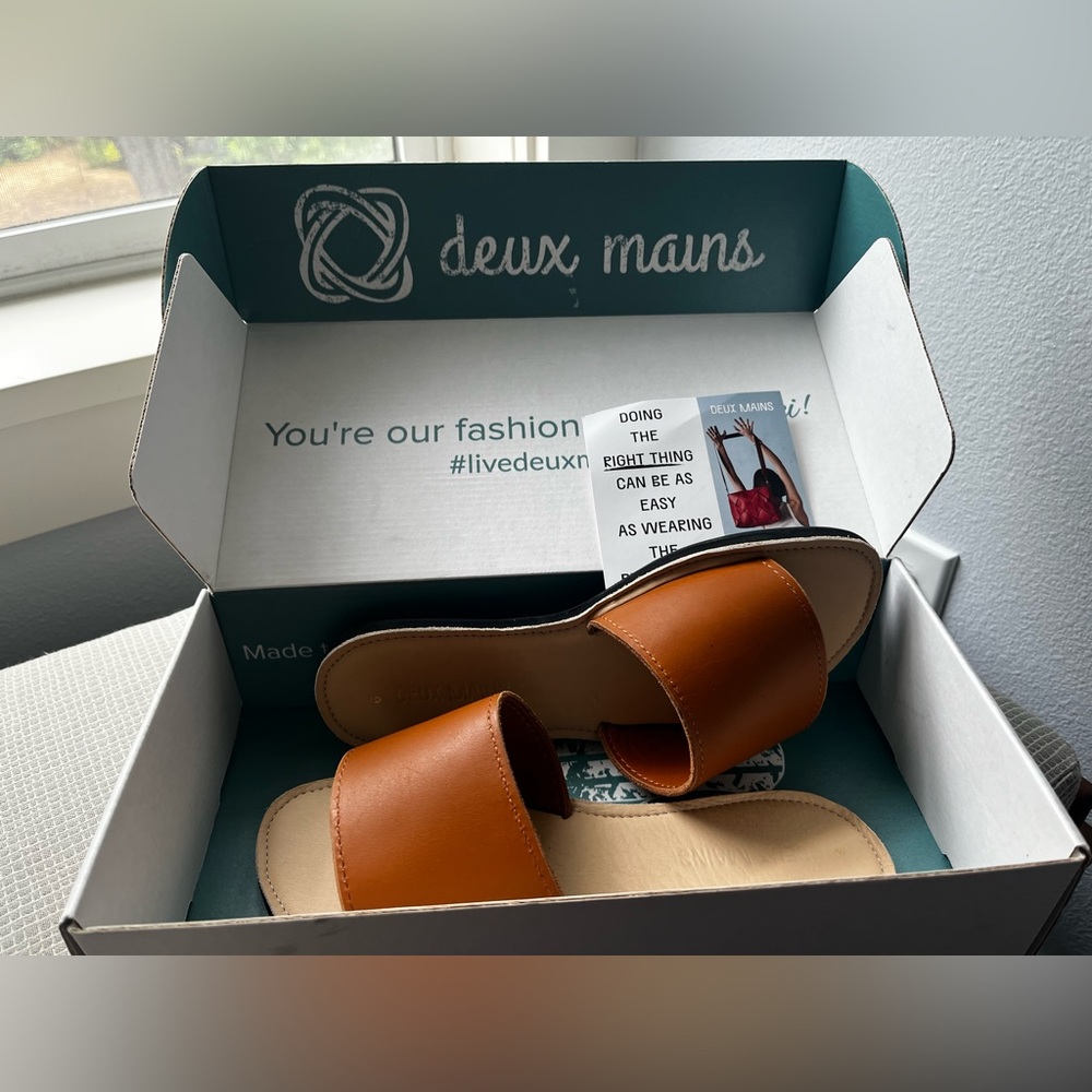 Women’s cognac leather slides